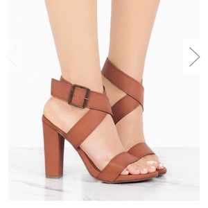 Never worn heels. Color cognac. Size 8